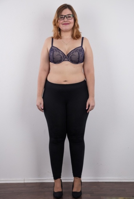 Amateur fatty Karolina shows her flab in the nude wit her glasses on