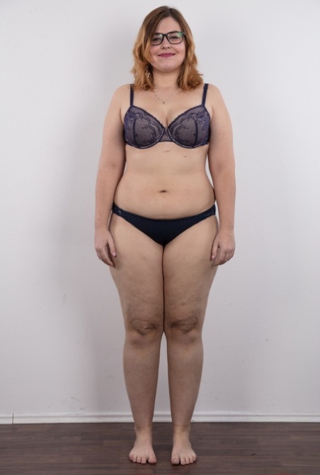 Amateur fatty Karolina shows her flab in the nude wit her glasses on