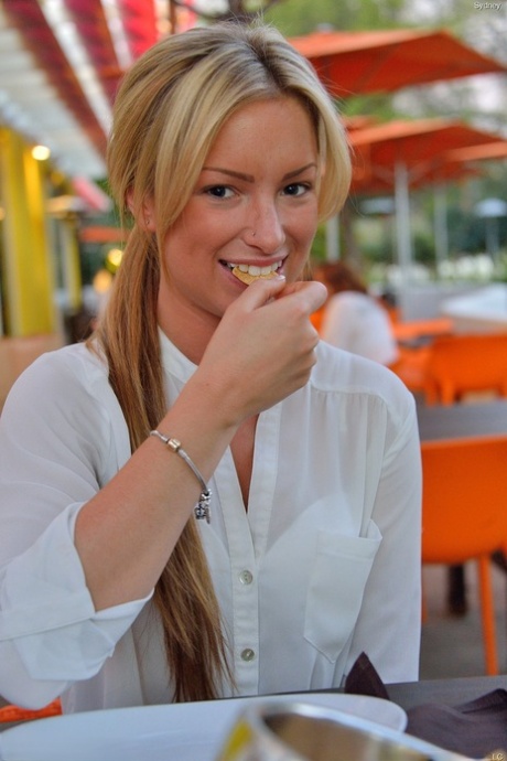 Skinny blonde teen Sydney shows her small ass and twat in public