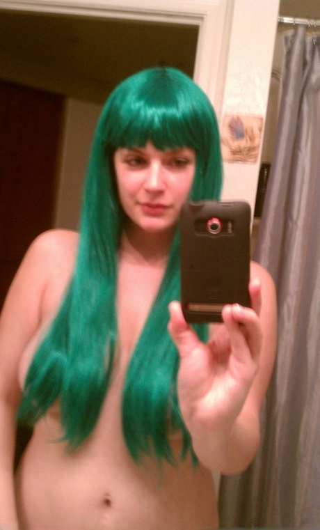 Amateur girl Danielle takes safe for work self shots around her house