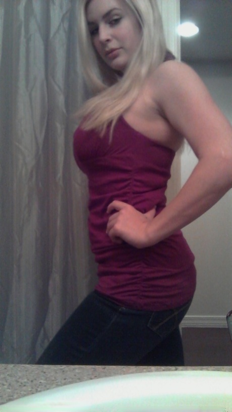 Amateur girl Danielle takes safe for work self shots around her house