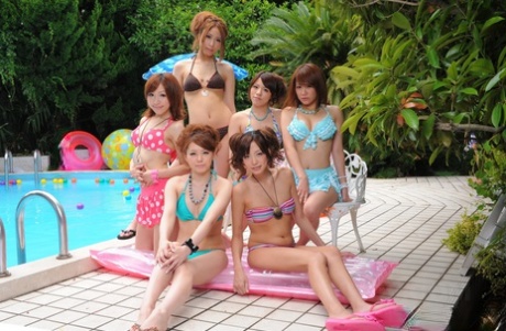 Sweet Japanese girlfriends in sexy swimsuits flaunt their beauty poolside