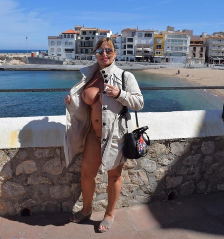 Shameless MILF Nude Chrissy flashes her big knockers and pussy in public