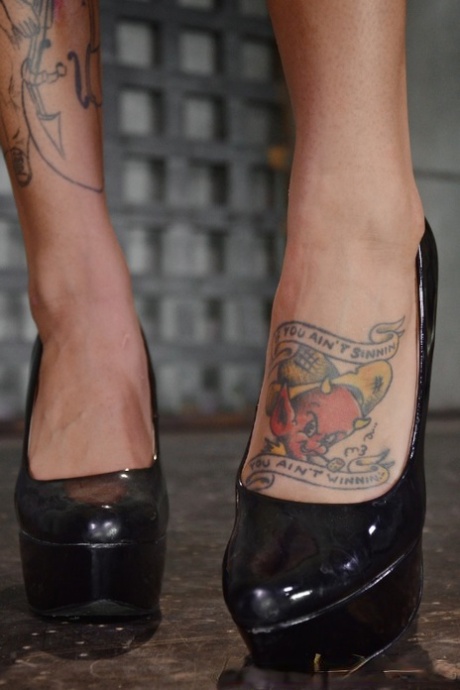 Ink queen Bonnie Rotten gets facialed after being used as a sex slave