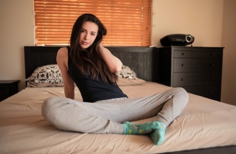 Git brunette Casey Calvert sticks a finger in her tight asshole