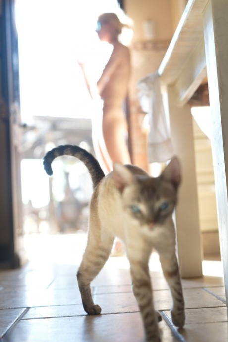 Thin blond chick Chloe Toy enjoys a smoke as she goes about her daily business