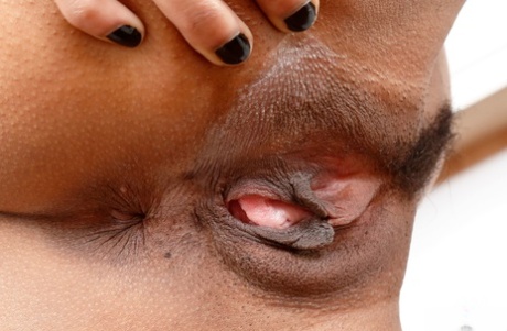 Exotic beauty Nikki Darling giving arousing closeup views of her spread pussy