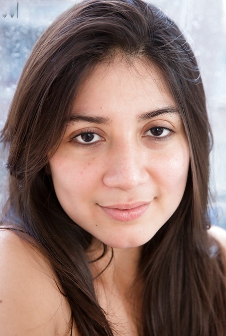 Barely legal girl Mona flashes natural tits and hairy vagina