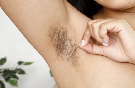 Latin-American solo girl Nenetl Avril exposes her hairy pits and bush