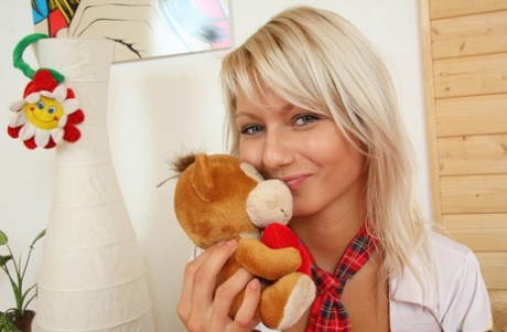 Young blonde Pinky June gets cum on tits after sexual relations with boyfriend