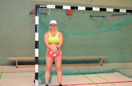 Busty mature fatty gets fitness coaching while stark naked in the school gym