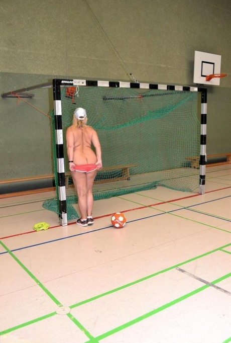 Busty mature fatty gets fitness coaching while stark naked in the school gym