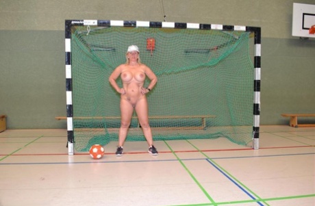 Busty mature fatty gets fitness coaching while stark naked in the school gym