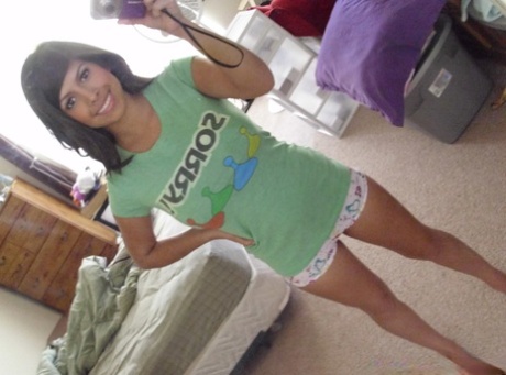 Latina teen Layla Rose takes selfies of her great tits and shaved pussy