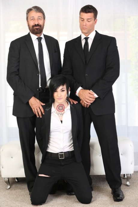 Dark haired girl Nikki Hearts has sex with 2 male co-workers at the same time