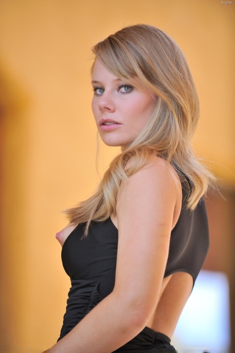 Glamour babe Brigitte takes off her sexy black dress to flaunt her lovely body