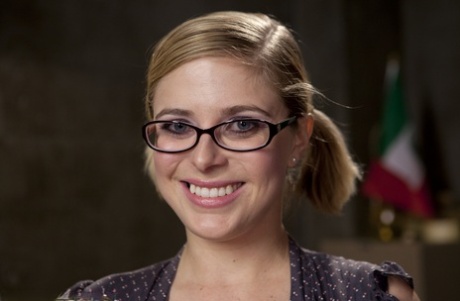 Nerdy pornstar Penny Pax shows her natural tits and poses in sheer pantyhose