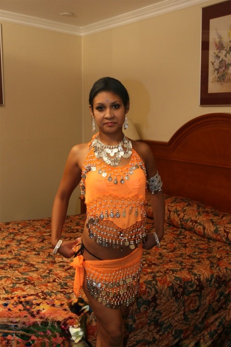 Pretty Indian babe Dipti strips off her sari and shows off her boobs and pussy