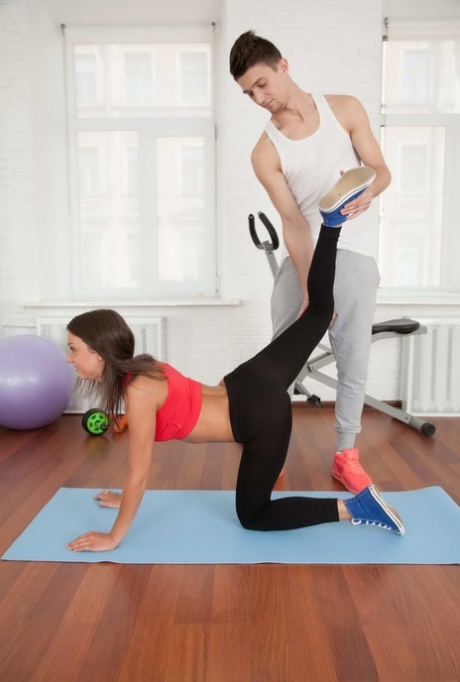 Athletic teen Angel wears cum on her face after fucking her personal trainer