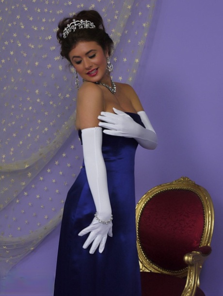 Prom queen Kelly Hall undresses to her vintage undies after accepting crown