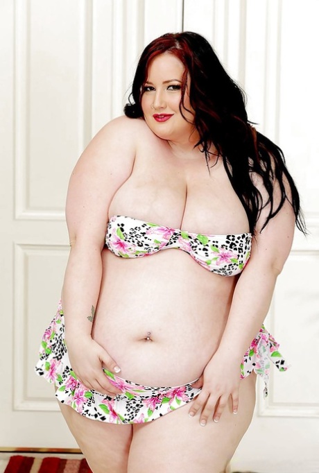 SSBBW Eliza nurse posing in heels and naughty nurse uniform