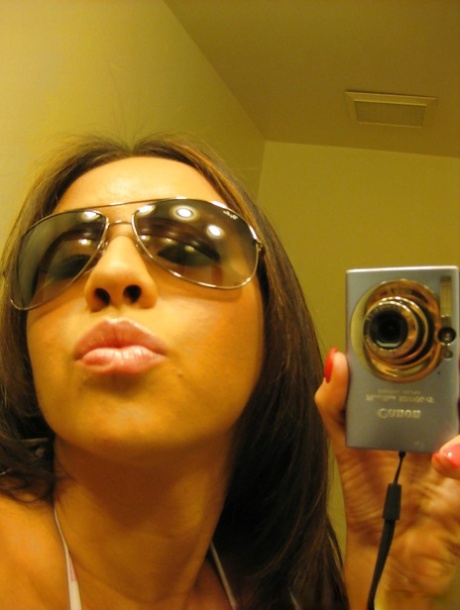 Hot Latina female Perfect Petra taking selfies of her nice melons