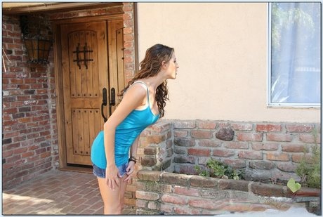 Stunning pornstar Kortney Kane takes a young dick in her mouth and twat