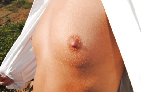 Sexy teen Paris Love showcasing her tiny titties and sweet pussy outdoor