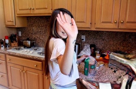 Eskimo babe Lily Lust gets naked in the basement and shows her hot pussy