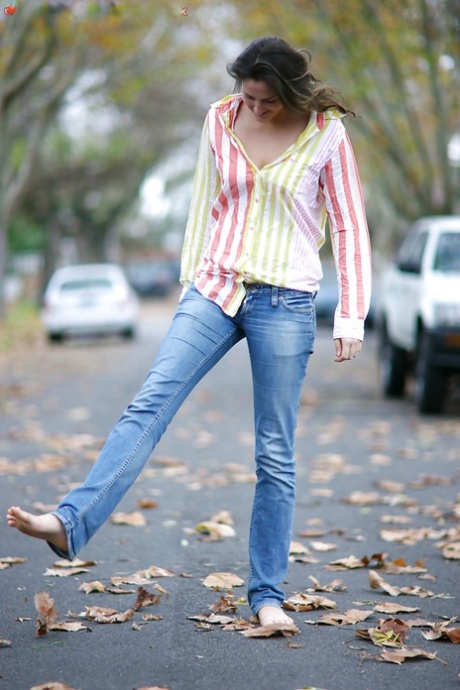 Adorable brunette babe Darya showing off her hairy cunt outdoors