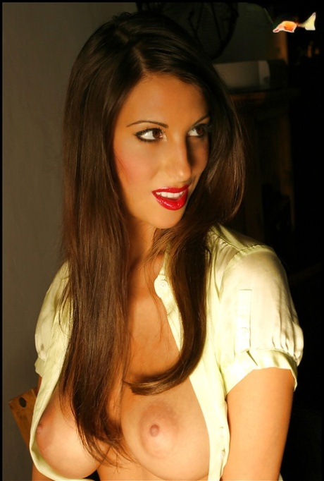 Busty babe unbottons her satin blouse and shows fine boobs