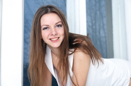 Sweet teen girl fingers her bum while posing in the nude for the first time