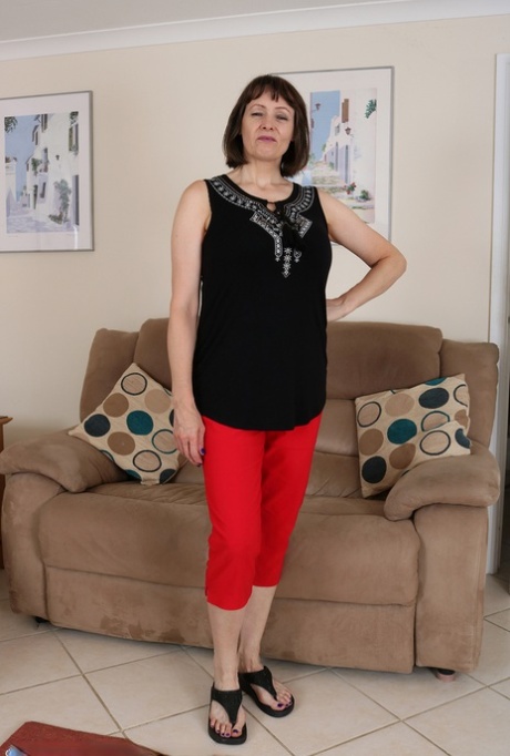 Older horny Tigger in leopard print lingerie happily spreadiing bald pussy