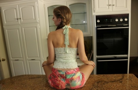 First timer Alyce Anderson gets naked on kitchen counter to part her pussy