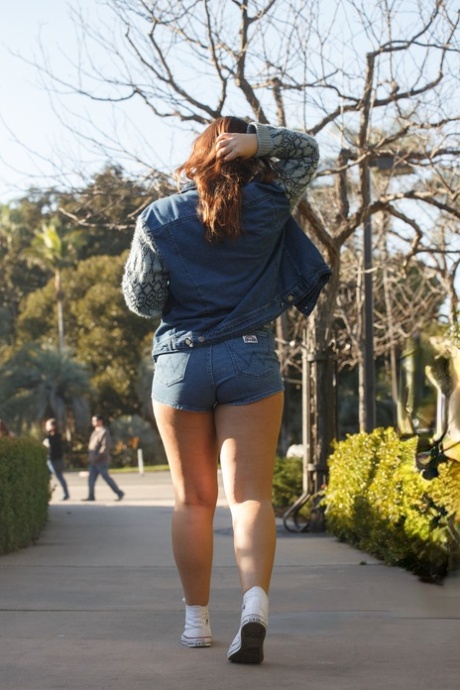 Cute brunette Tammy Kaimia flashes big round tits and juicy thighs