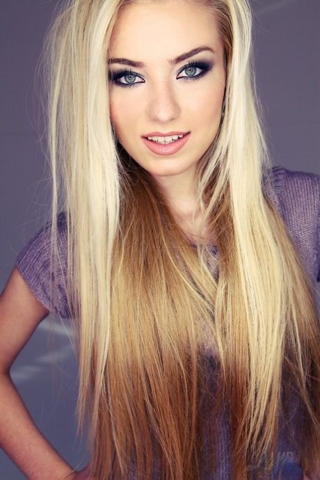 Beautiful blonde skinny girl Diana strips sexy dress to and stretches naked