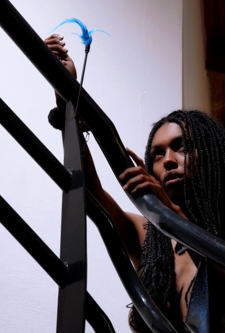 Naked black teen Samantha A attends to her horny pussy while cuffed to rails