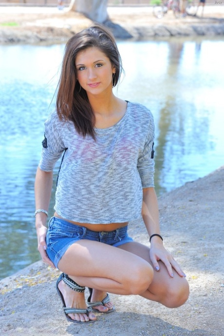 Skinny girlfriend Jody strips nude and poses by the river in public