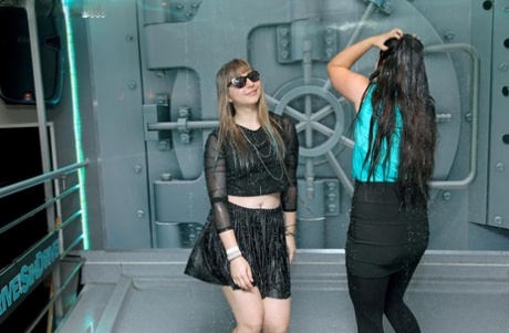 Fully clothed girl dance and get soaking wet during sprinkler malfunction