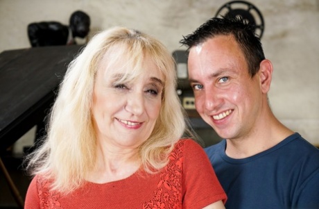 Horny blonde granny piano teacher gets her tight old ass fucked by student