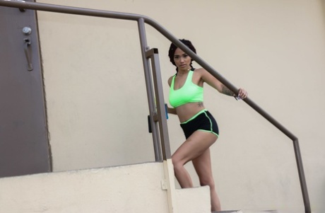 Glistening sweaty ebony Julie Kay gives blowjob & fucks trainer during workout