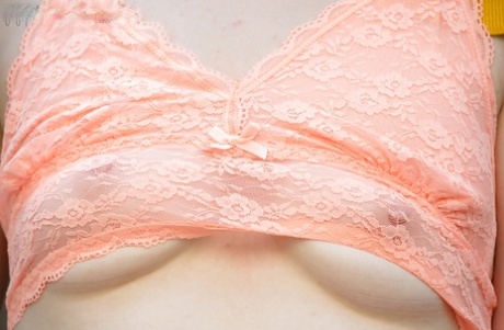 All natural redhead Emma B parting labia lips after undressing on patio