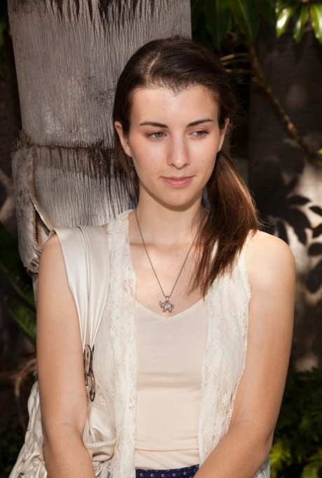 Brunette teen Melissa shows her pink undies and teases with her hard nips