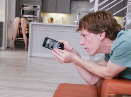 Hot redhead Lauren Phillips gets kinky with rubber gloves in kitchen blowjob