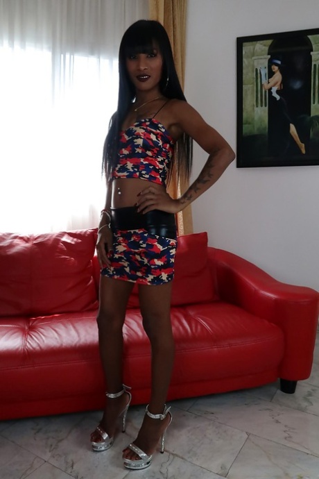 Long legged ladyboy Maria undressing for sexual relations with well hung man