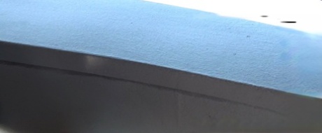 Oblivious busty Karmen Jay's big tits captured in downblouse voyeur photos