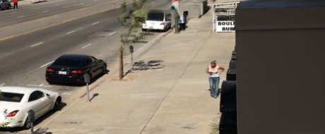 Oblivious busty Karmen Jay's big tits captured in downblouse voyeur photos