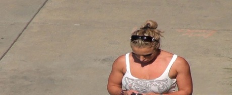 Oblivious busty Karmen Jay's big tits captured in downblouse voyeur photos