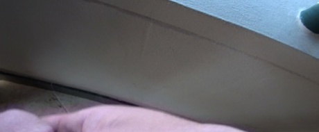 Oblivious busty Karmen Jay's big tits captured in downblouse voyeur photos