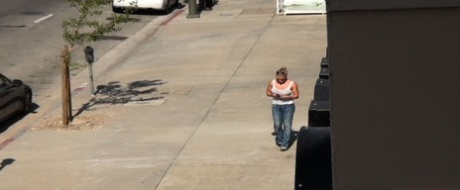 Oblivious busty Karmen Jay's big tits captured in downblouse voyeur photos